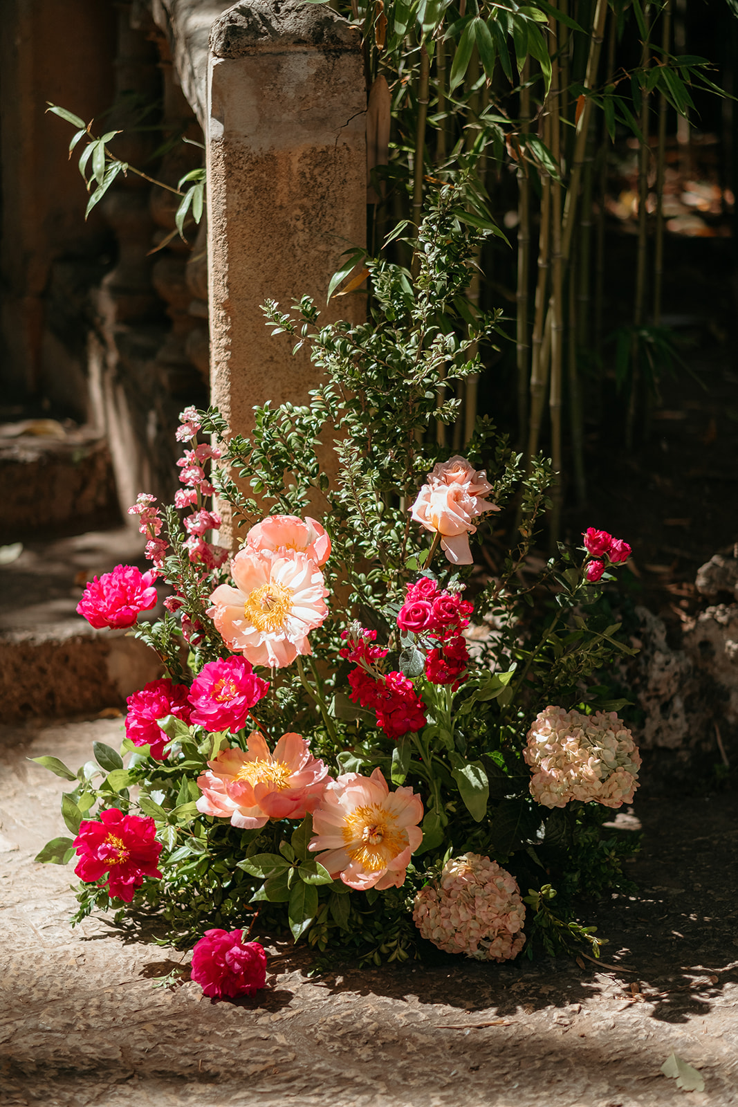 Jardines de Alfabia Wedding Mallorca Violeta Minnick Photography Floor Flower Arrangement Pink Red