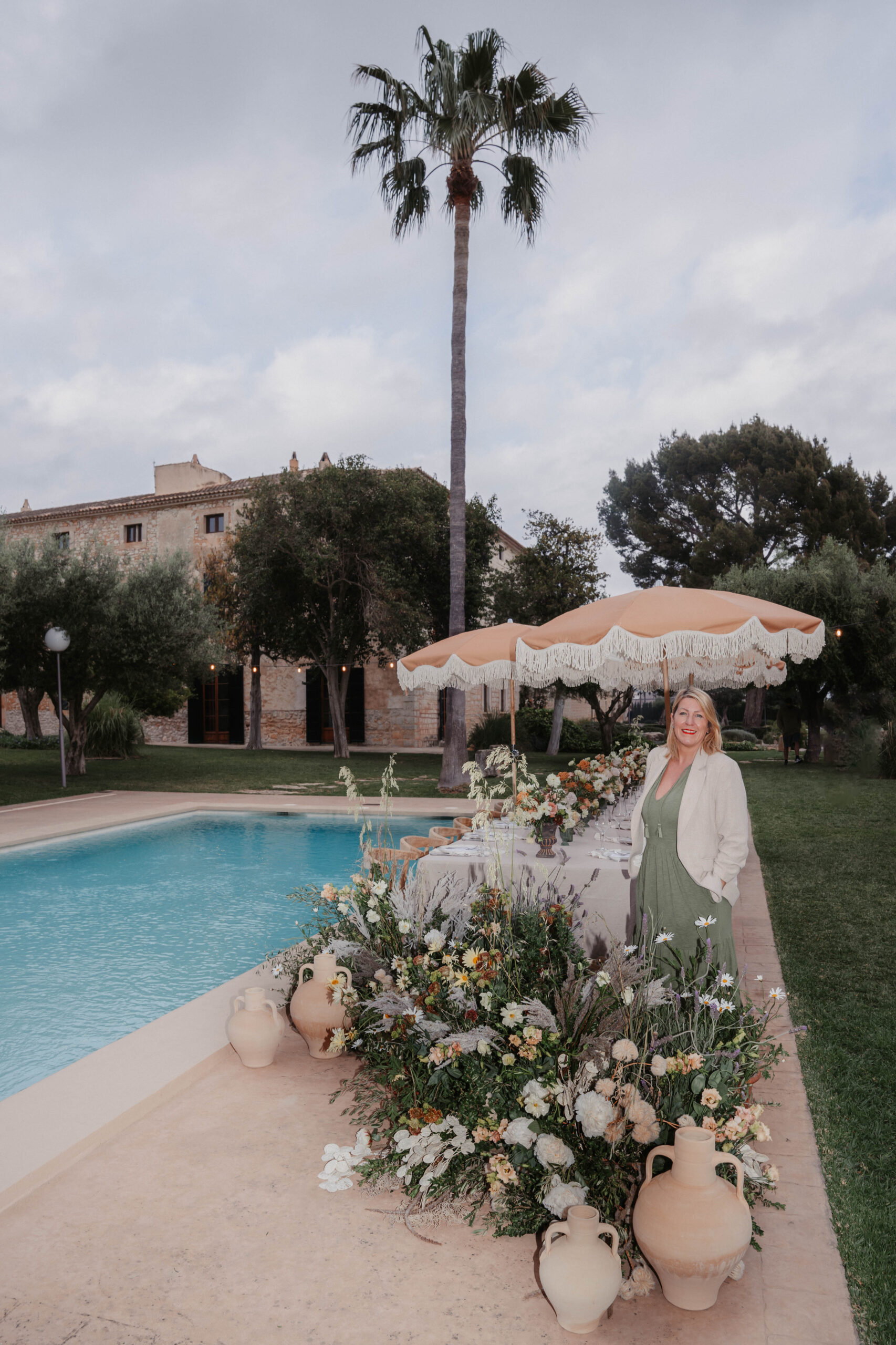 Finca Morneta Wedding Mallorca Charlotte Nelson Photography Paula Rooney Pool Table Parasols Floor Flowers Terracotta