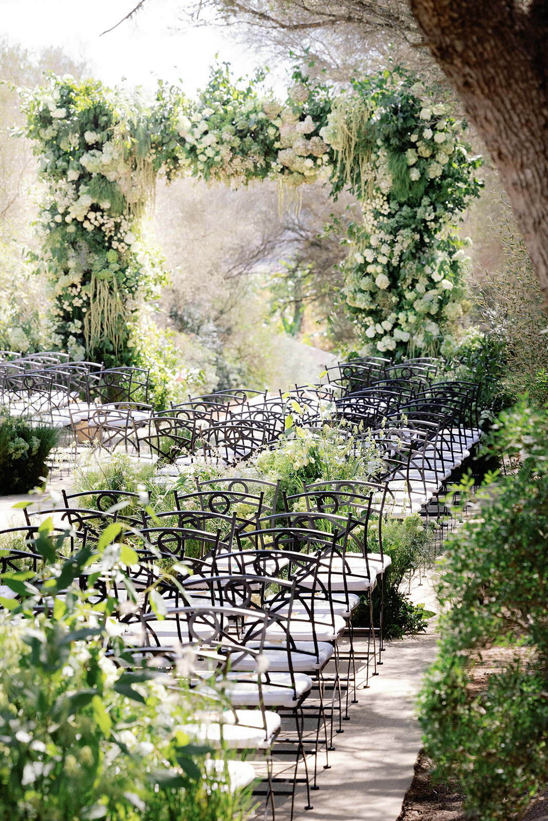 Aisle Ceremony Outdoor Green White Flowers Decor Organic Wild Natural Arch Metal Chairs Finca Serena Mallorca Wedding Pablo Laguia