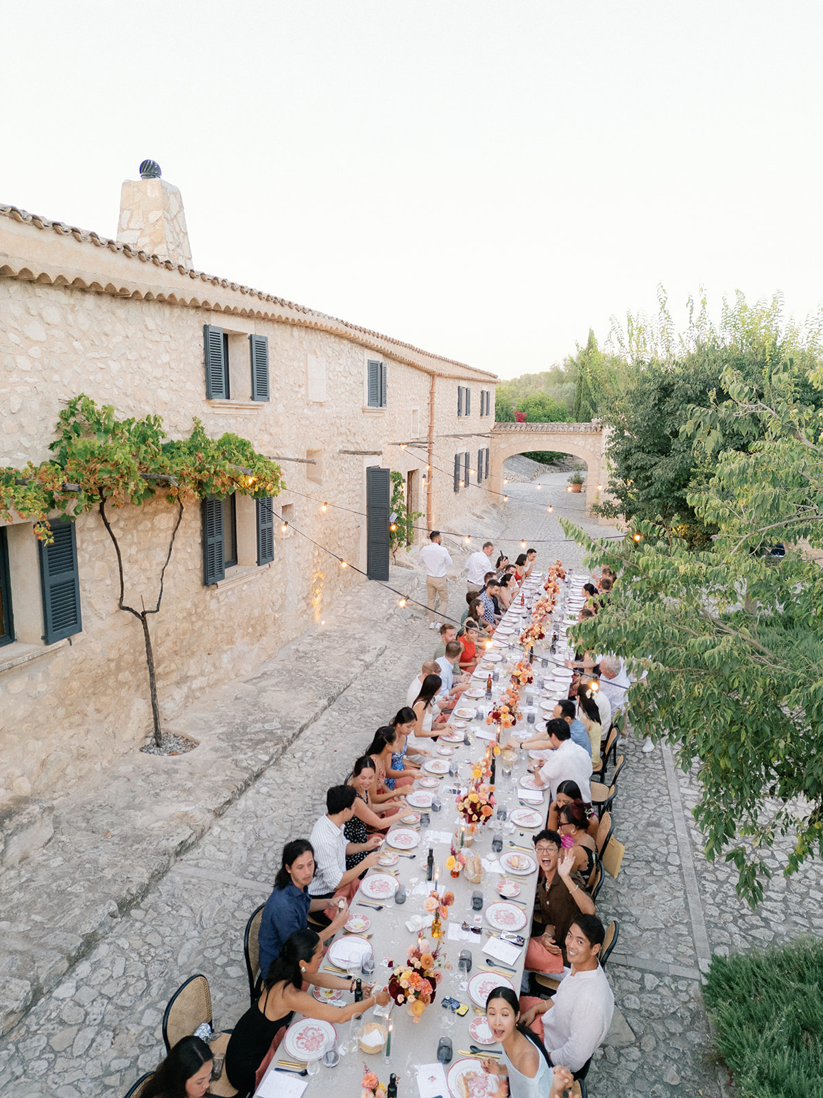 Long Outdoor Table Flowers Festoon Lights Finca Serena Mallorca Wedding Pablo Laguia