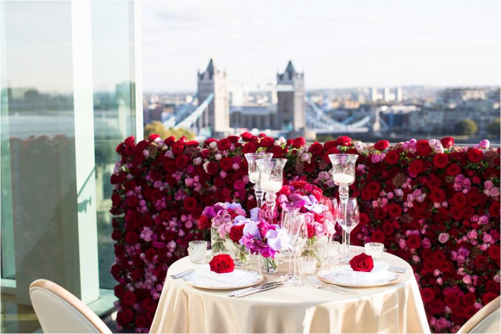 Proposal in London, florals created by Paula Rooney who created a flower wall backdrop overlooking London Bridge