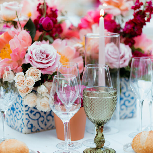 Jardines de Alfabia Wedding Mallorca Violeta Minnick Photography Table Centrepiece Pink Orange Red Flower Centrepiece Candle