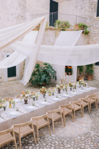 Finca Morneta Wedding Mallorca Ross Hurley Photography Long Outdoor Table Flowers Drapes Decor