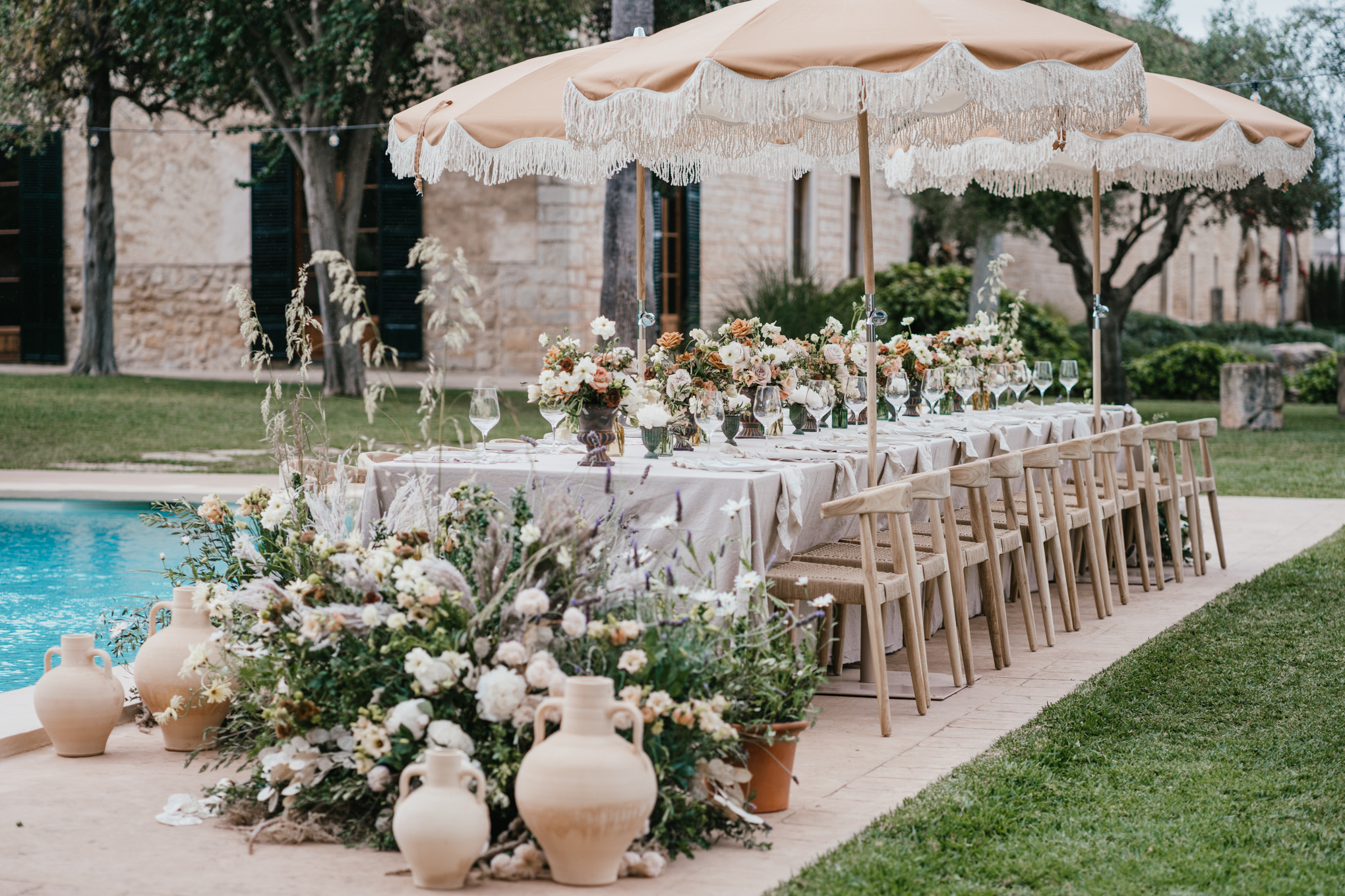 Finca Morneta Wedding Mallorca (c)Liz Greenhalgh Photography Pool Table Parasols Floor Flowers