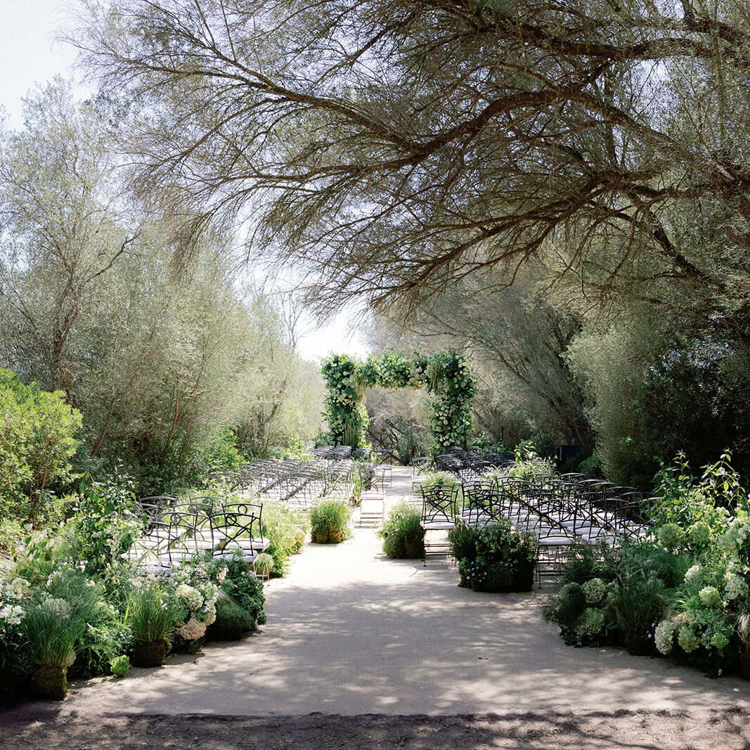 Finca Serena Mallorca Wedding Pablo Laguia Aisle Ceremony Outdoor Green White Flowers Decor Organic Wild Natural Finca Serena Mallorca Wedding Pablo Laguia